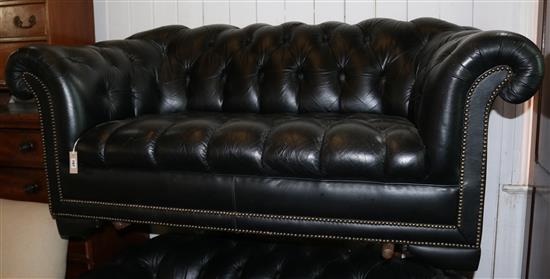 A black leather Chesterfield